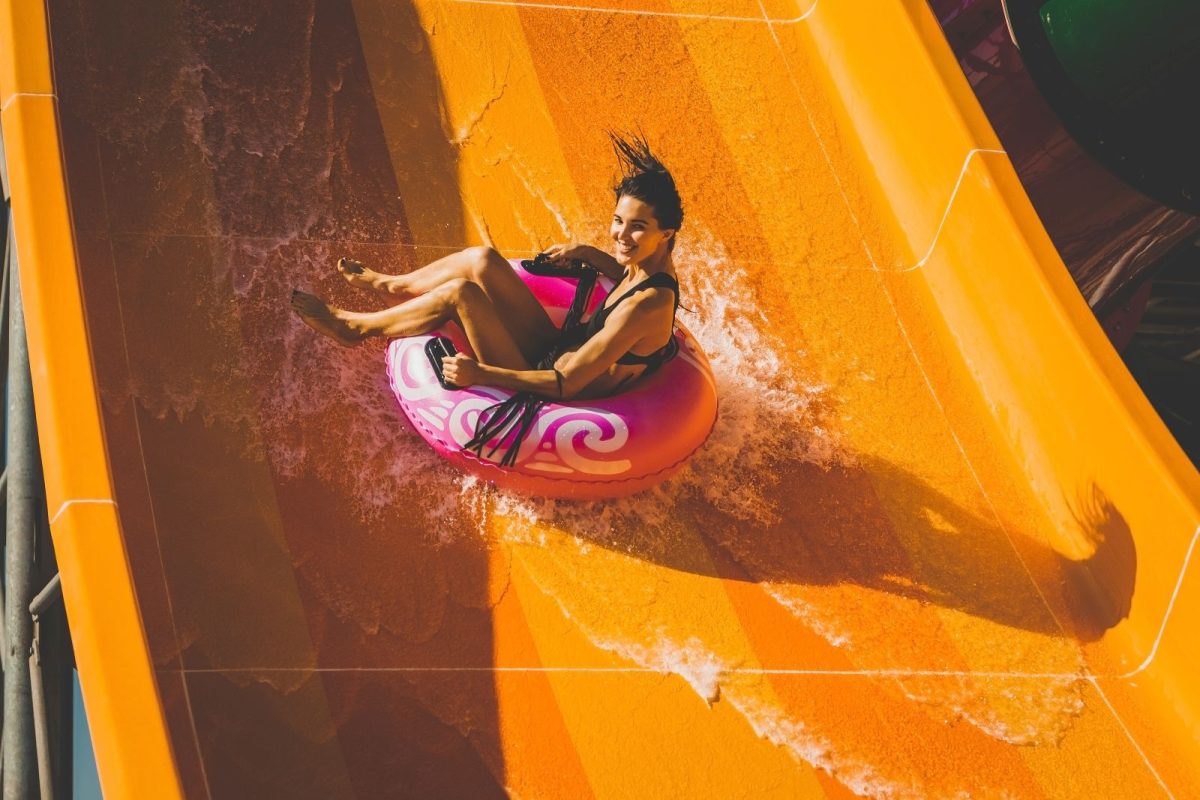 woman in tub on waterslide